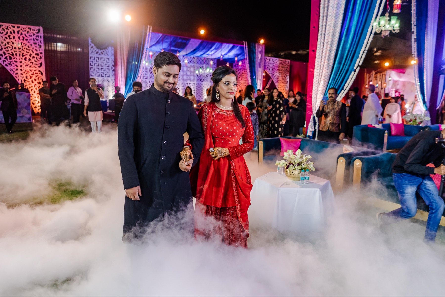 The couple making a grand entrance amid dry-ice clouds